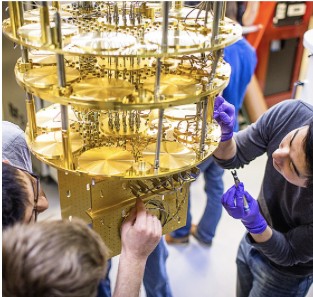 Researchers assembling a quantum computing device — the hardware behind our research infrastructure